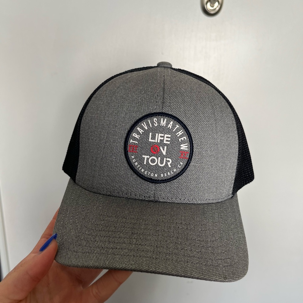 Travis Matthew gray and navy hat
